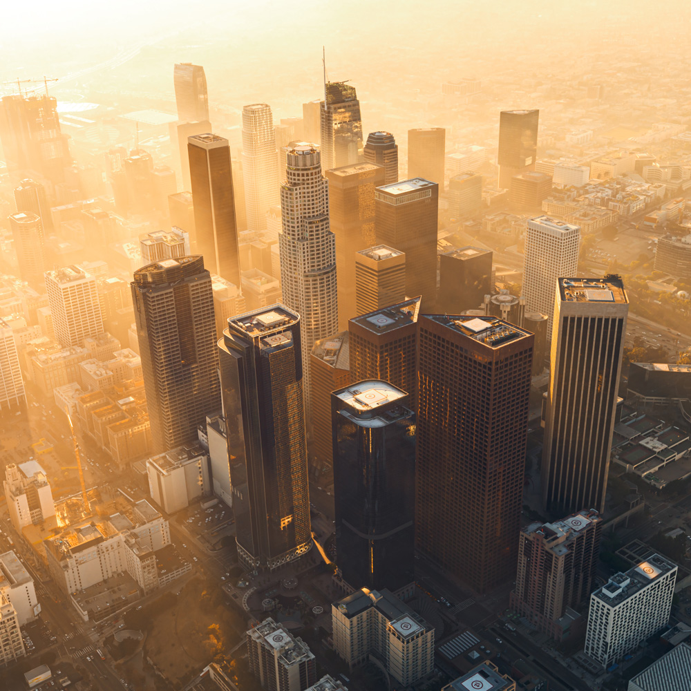 Woman smiling at a building