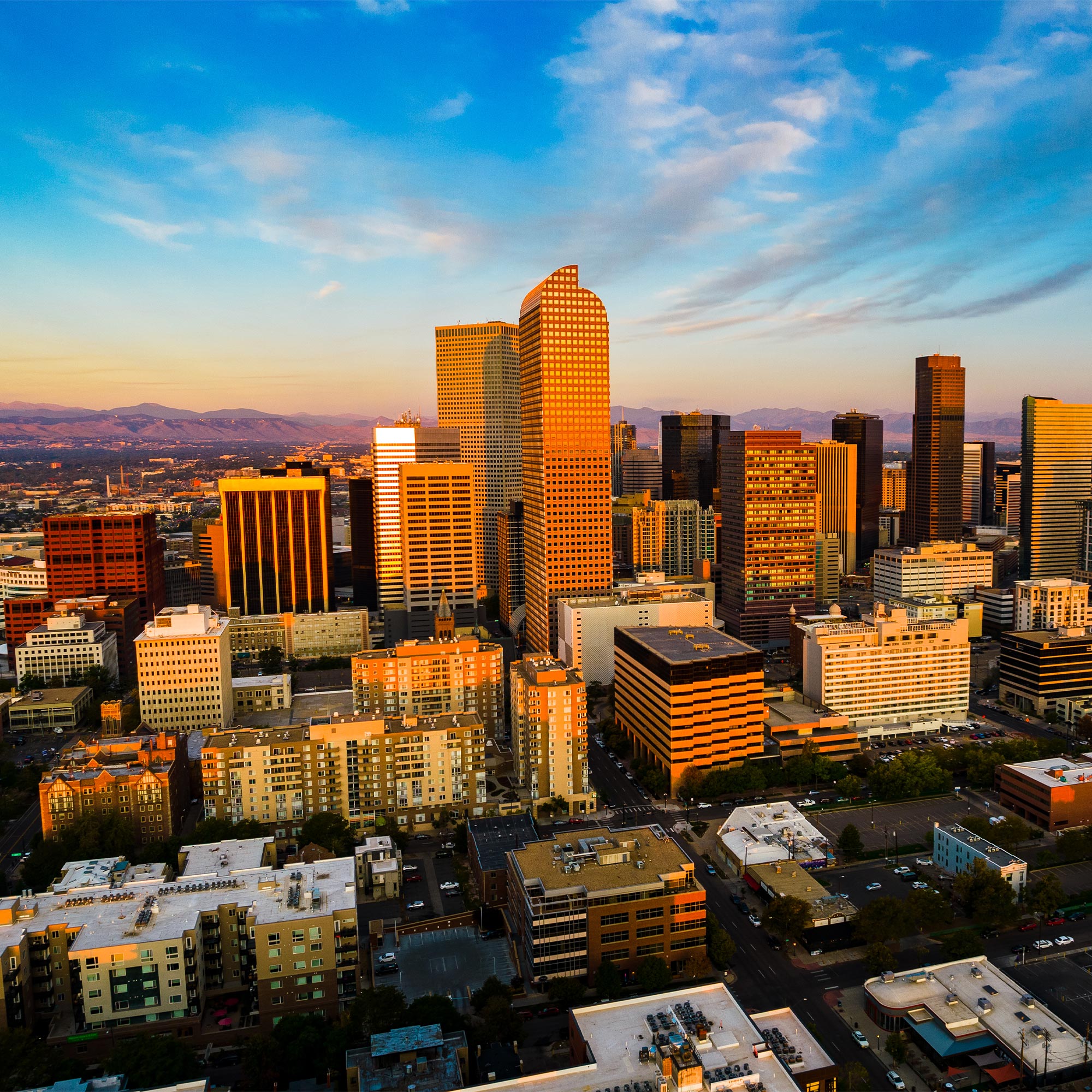 A skyline photo of Denver, Colorado at dawn
