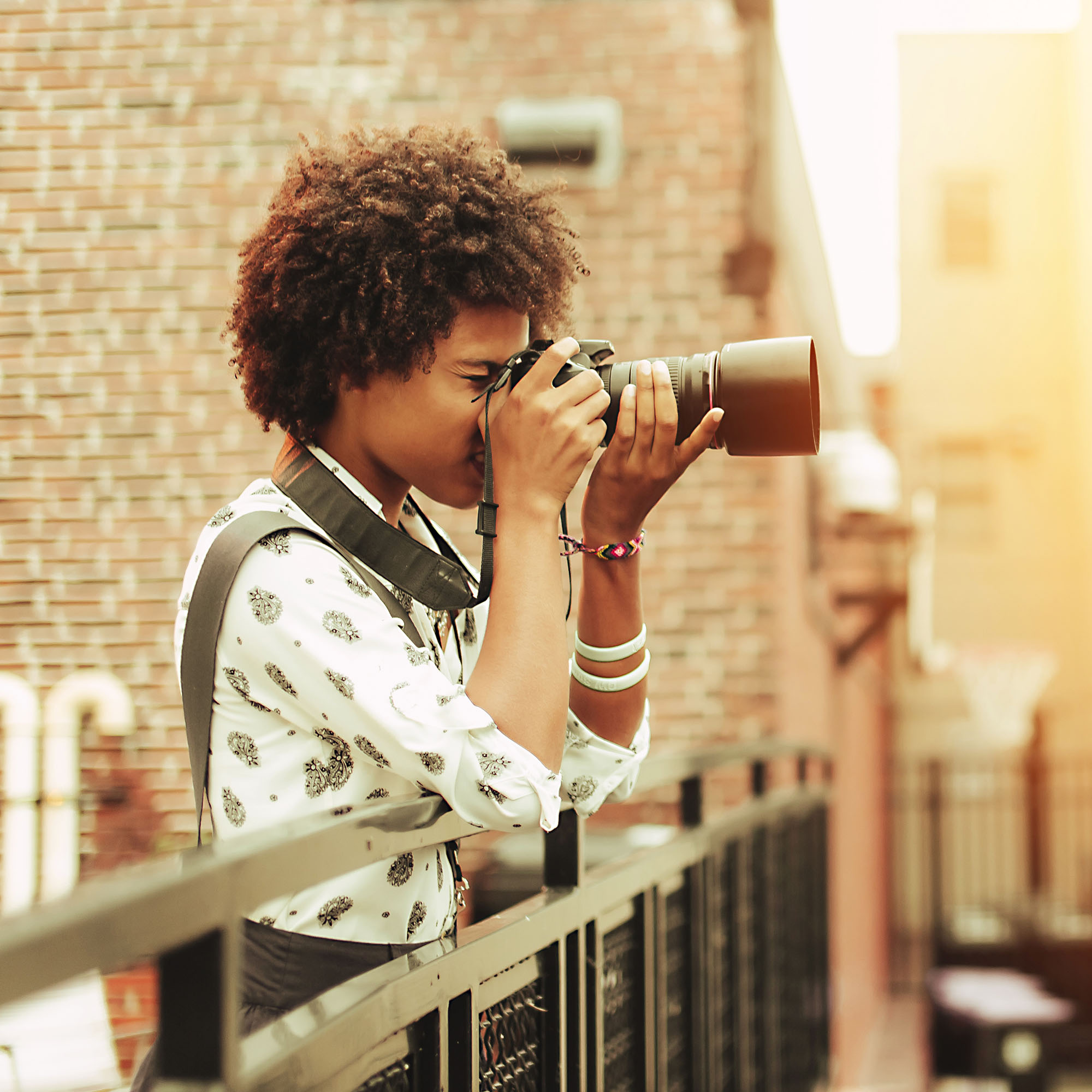 woman taking a professional photograph