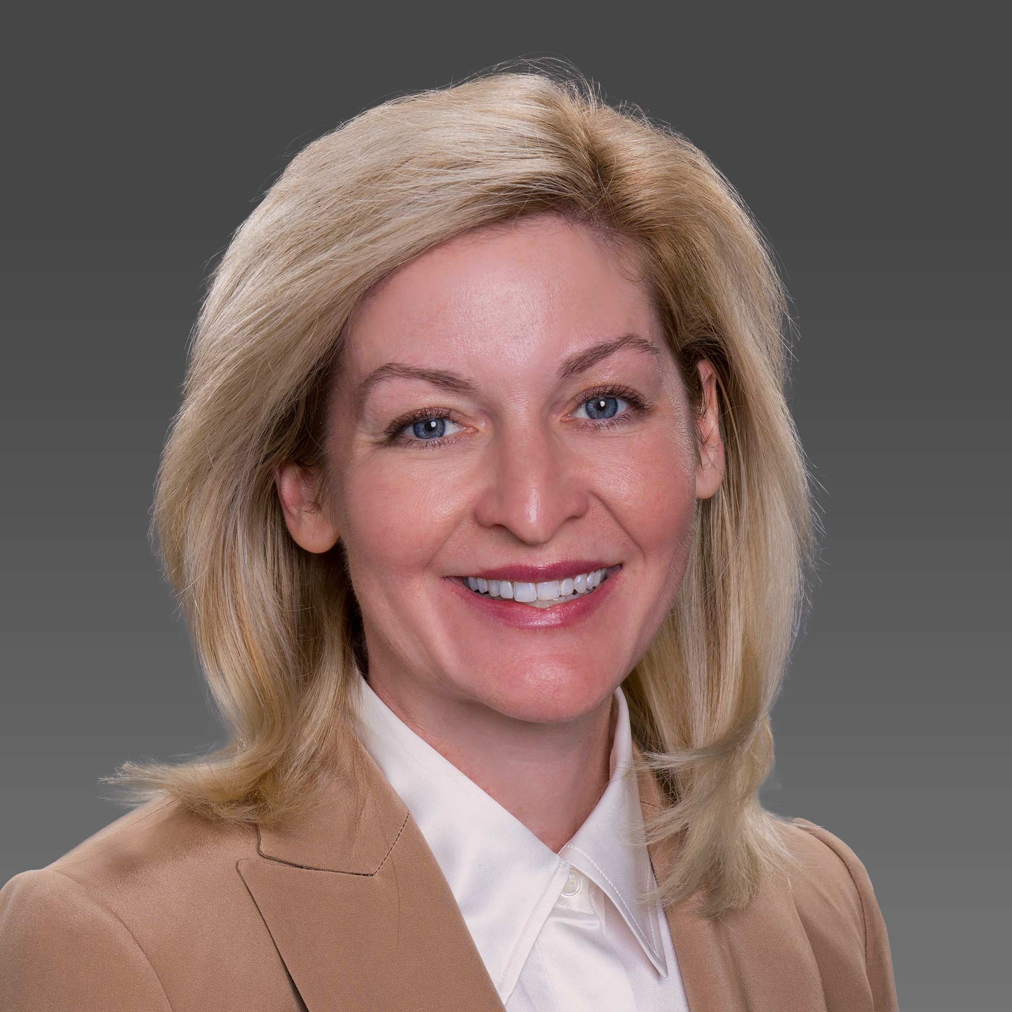 a woman smiling at the camera