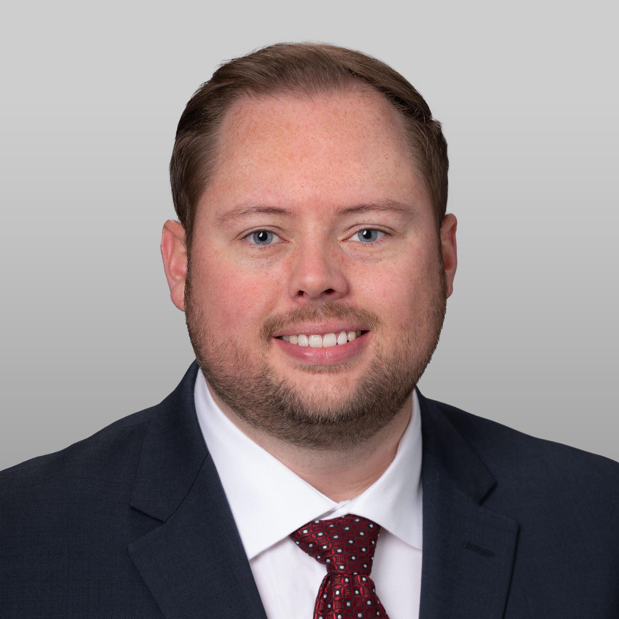 a man in a suit and tie