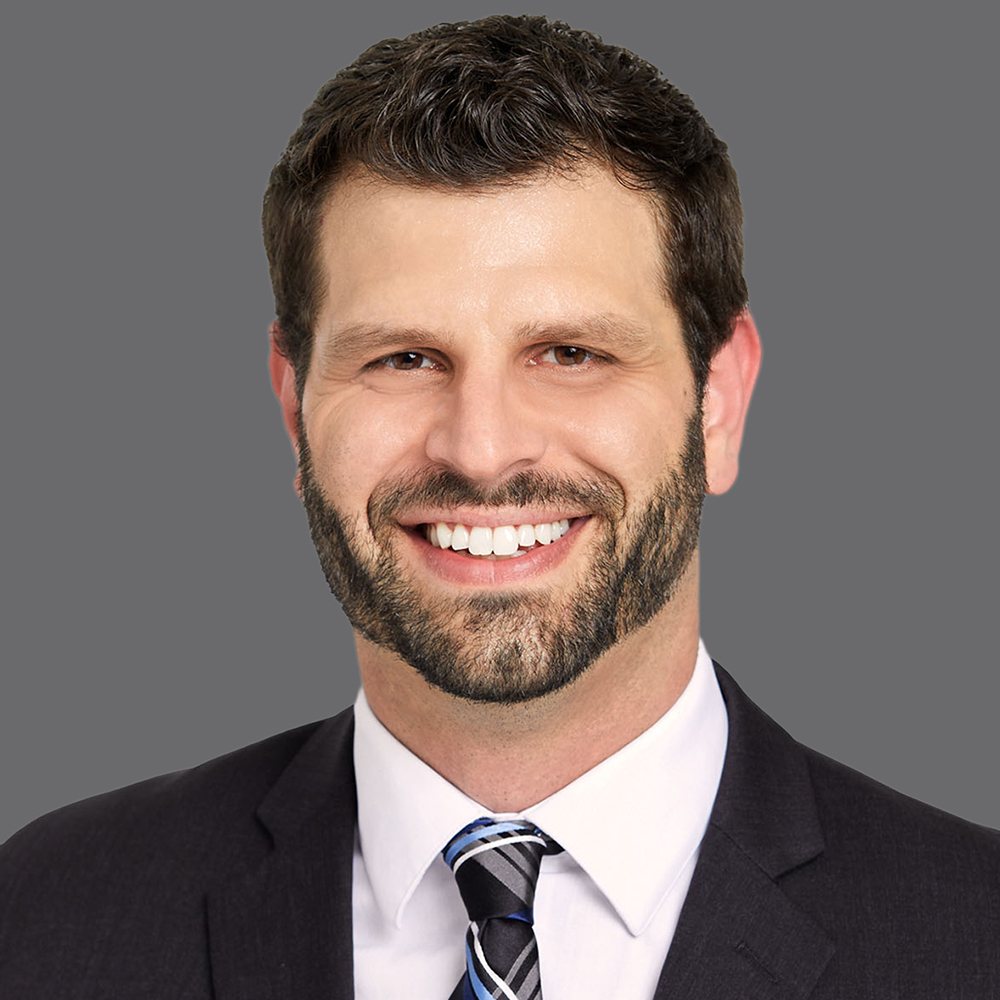 a man in a suit and tie