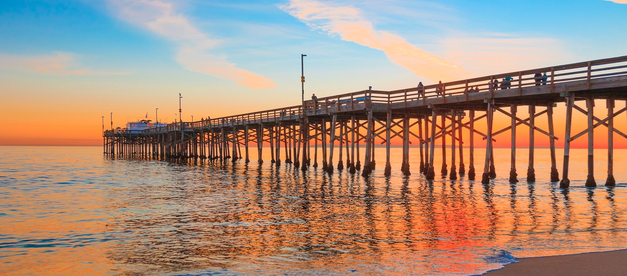 a long wooden bridge over water