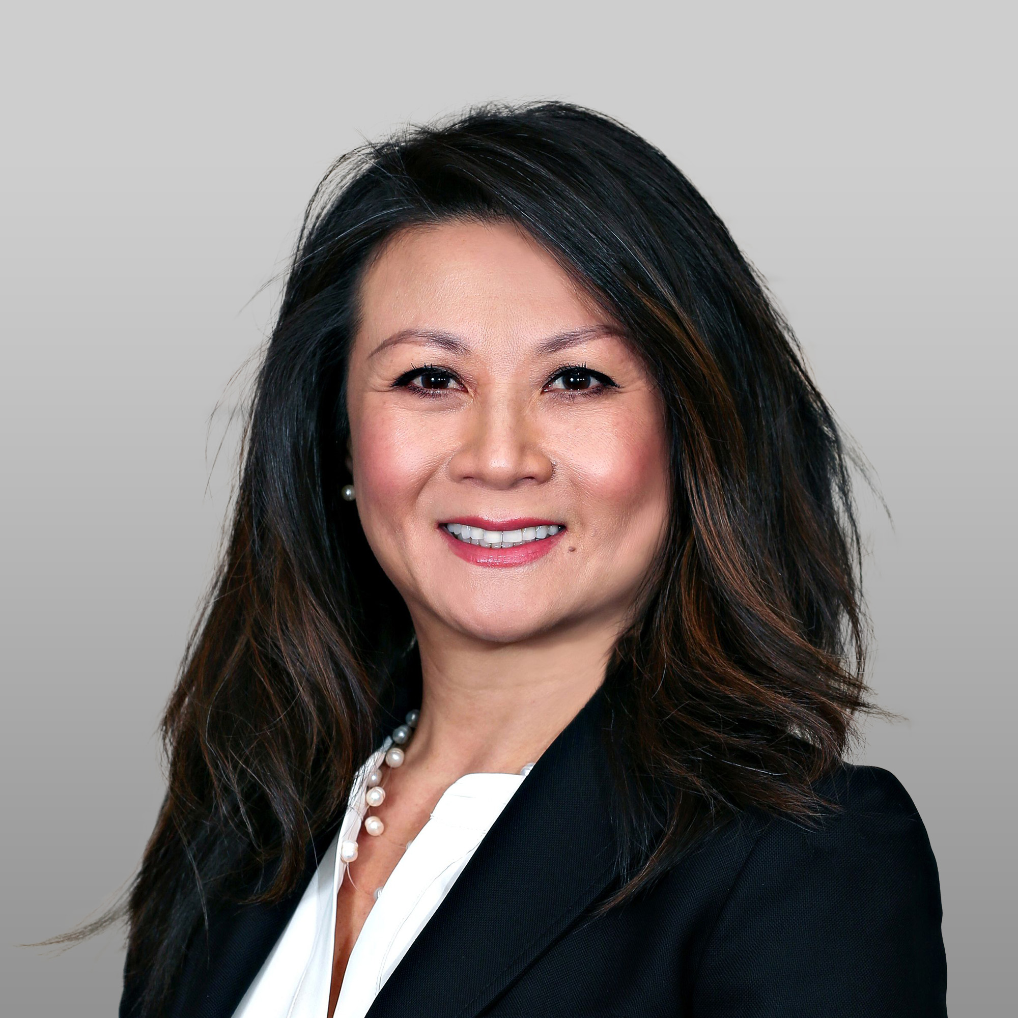 a woman smiling for a picture