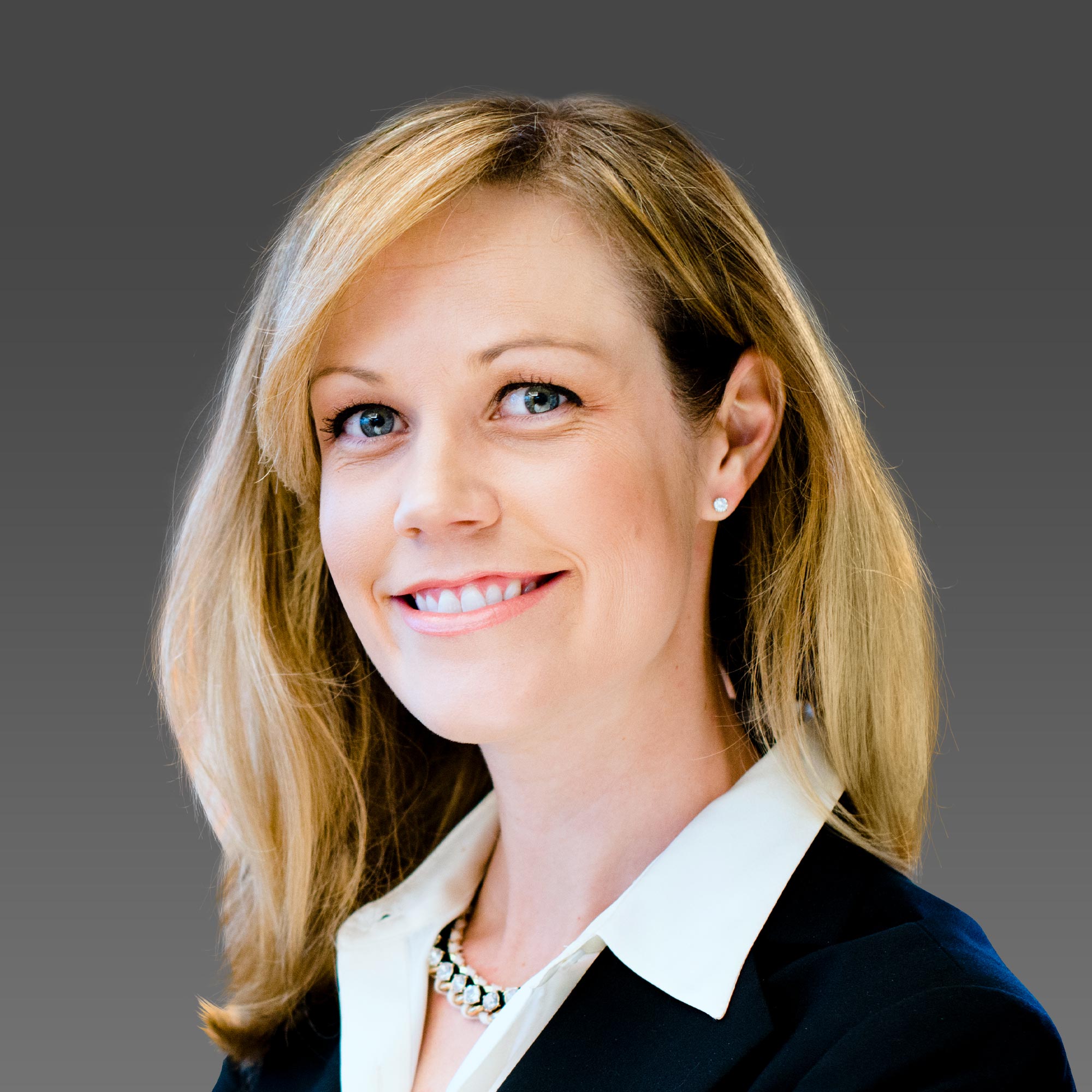 a woman smiling for a picture