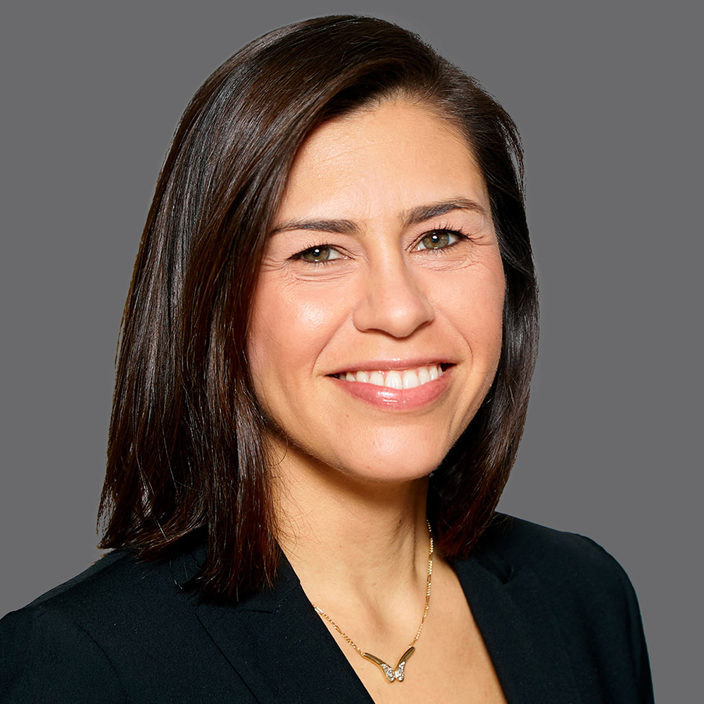 a woman smiling for a picture
