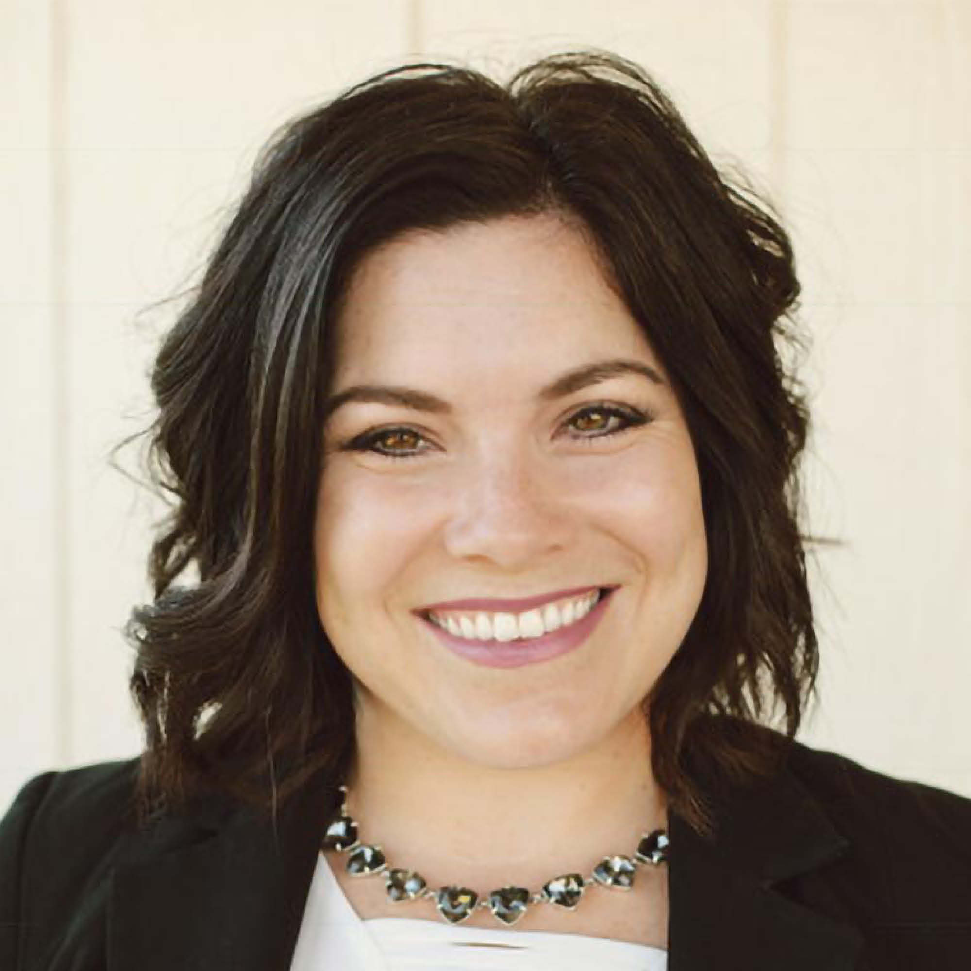 a woman smiling at camera
