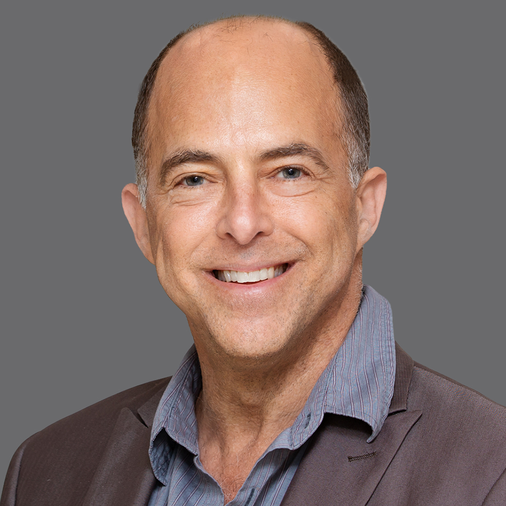 a man smiling for a picture