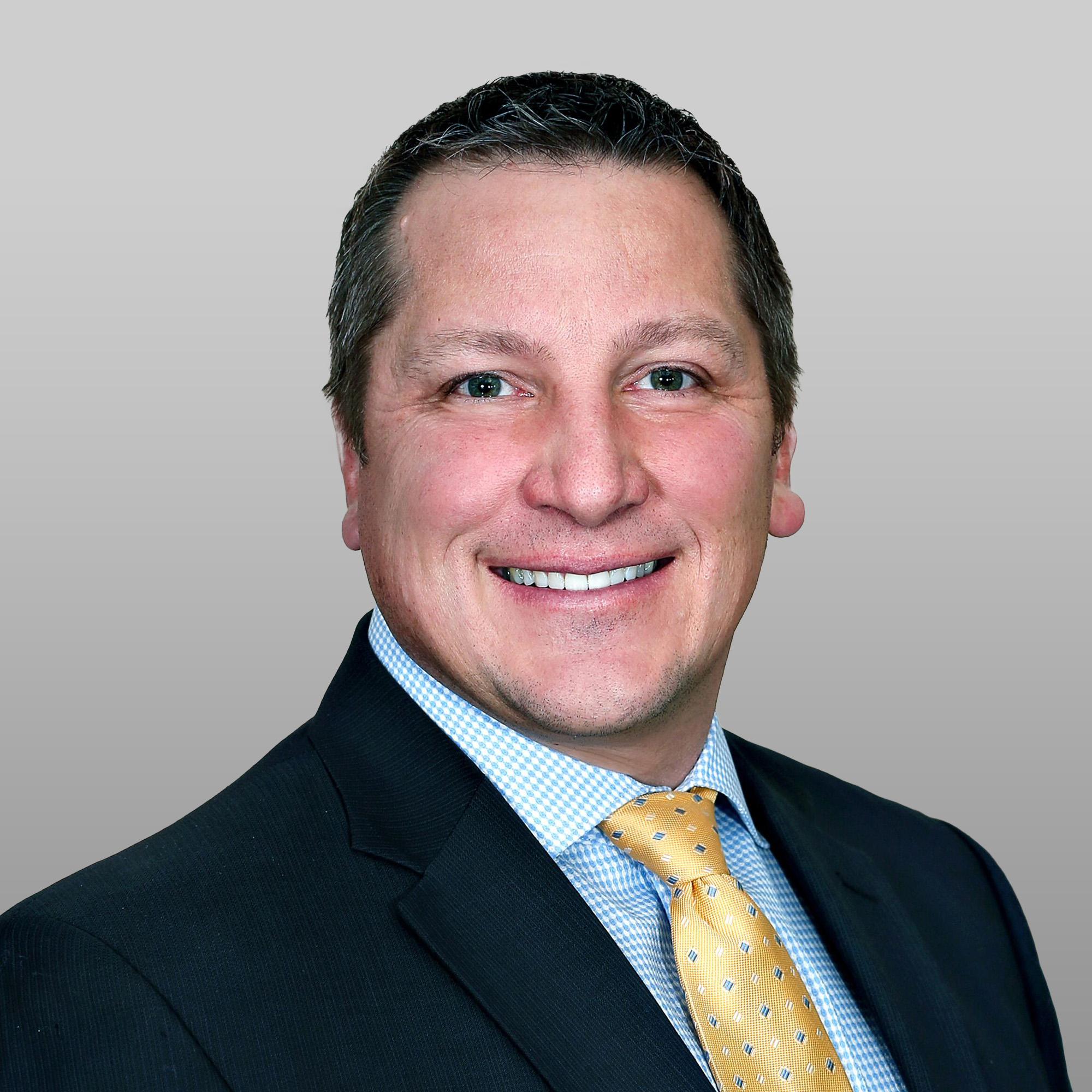 a man in a suit and tie