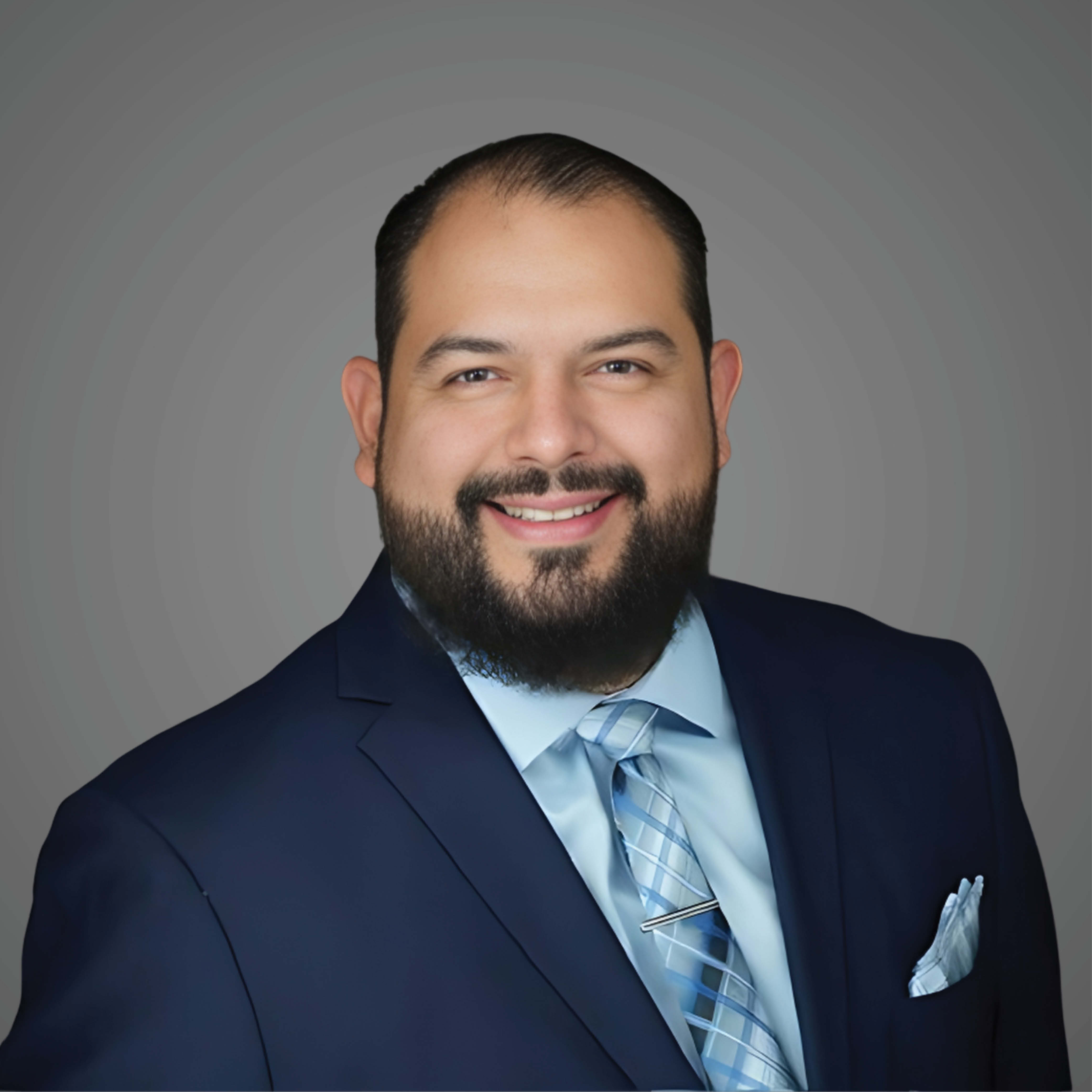 a man in a suit smiling