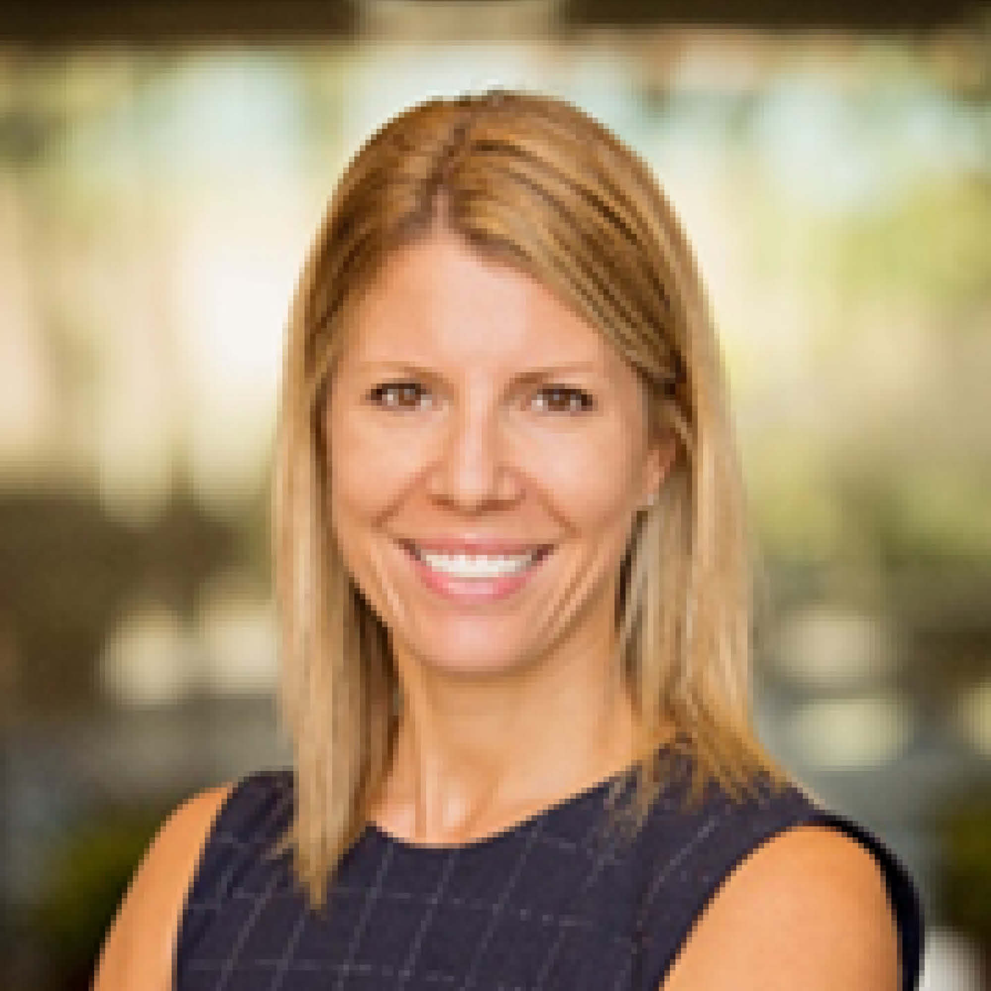 a woman smiling at camera