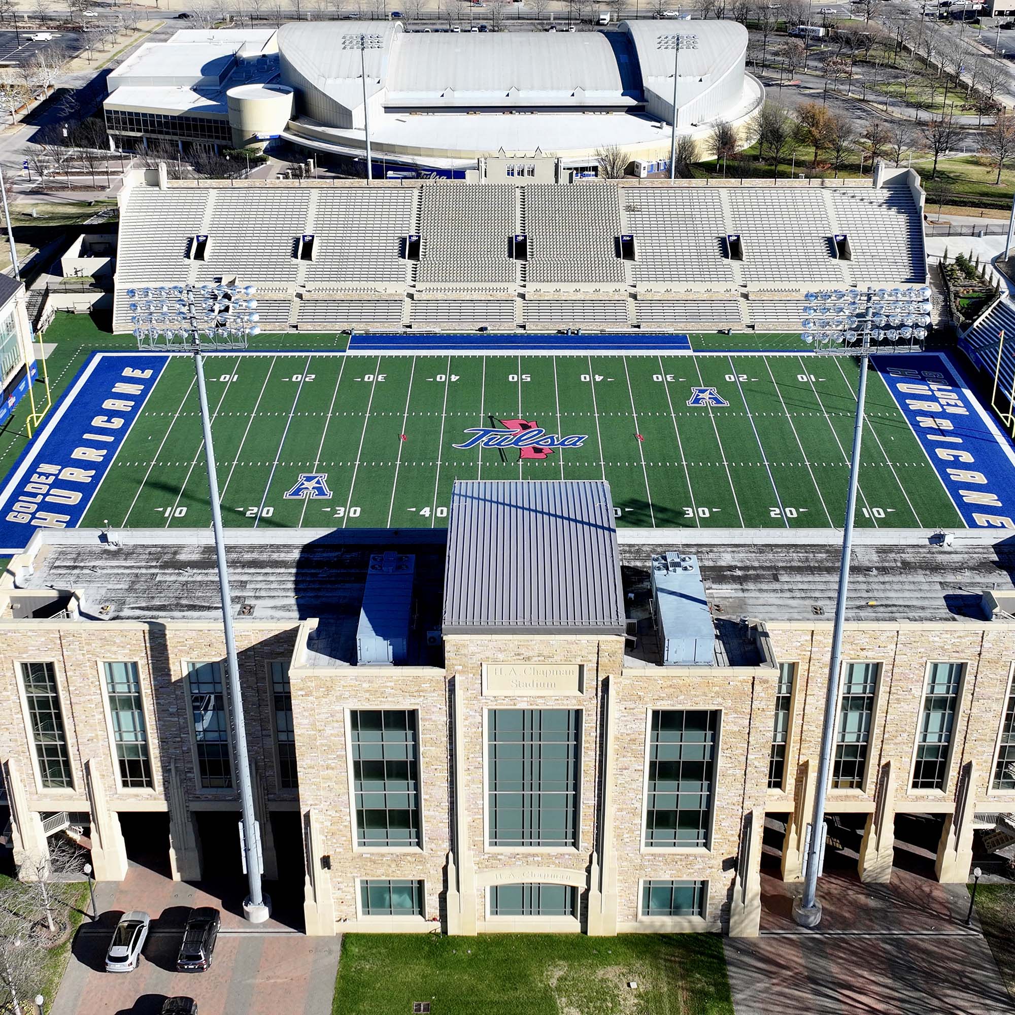 a football stadium with a large stadium and a parking lot