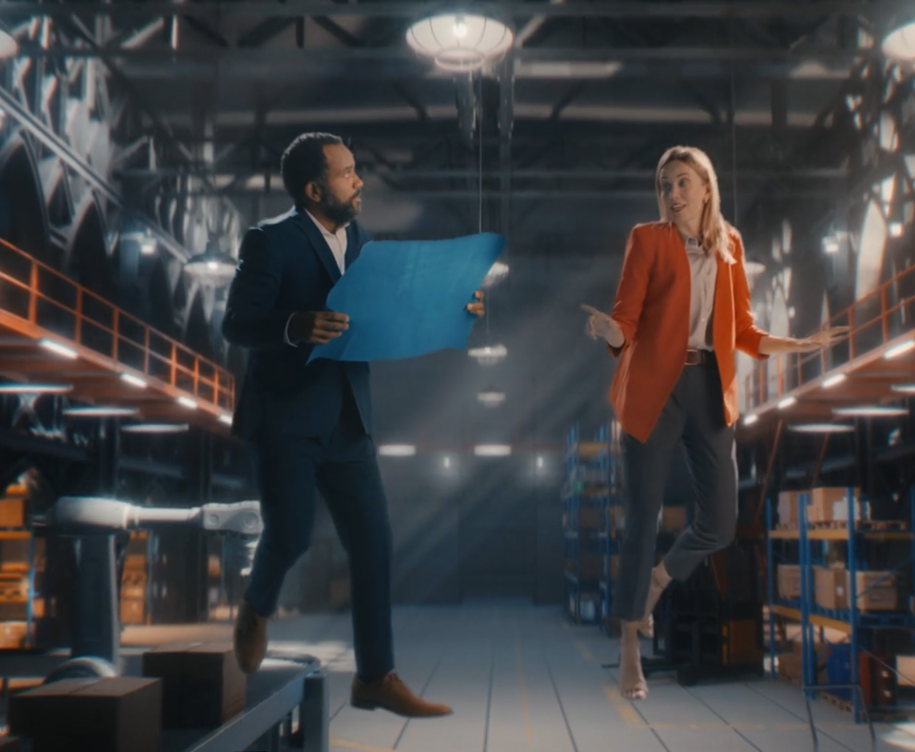 A family of four walk on the beach.